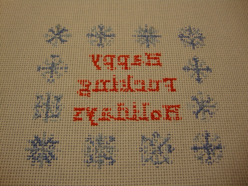 Backing of holiday cross stitch