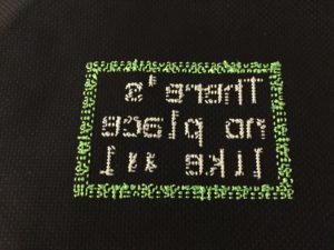 The back of the piece, because, again, that's how cross-stitchers brag